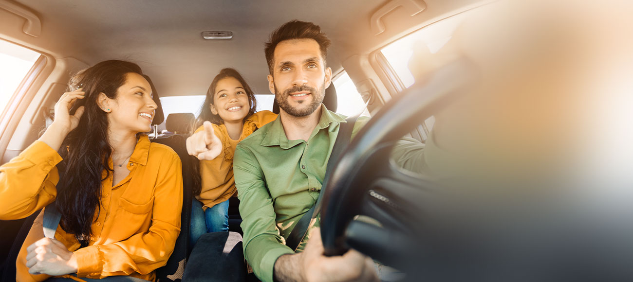 Happy family in a car. 